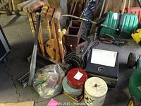 Croquet set wooden mallets, metal hoops, assorted tins, and ammo box