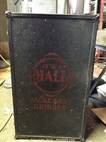 Closed black metal carrying case with red “It’s a Hall Valve Seat Grinder” lettering