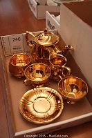 Gold lustre teapot, sugar bowl, creamer, two cups and two saucers in cardboard box