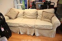 Front view of entire sofa with two pillows