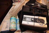 Overview of CPAP machine, humidifier, tubing, cleaning wipes, manual and carry bag