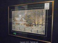 Framed print of winter snowy scene with house and fence