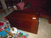 Closed chest front view showing dark brown stain and overall exterior condition