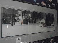Framed panoramic print showing winter scene, fence, trees and carriage silhouettes