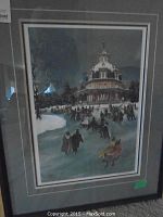 Framed print showing a winter skating scene at a pavilion with people ice skating, overall view of artwork.