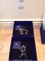 Miniature crystal piano and rose in blue presentation boxes with certificate cards
