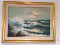 Framed oil on canvas seascape by Alessandro Maffei showing entire artwork with gold frame