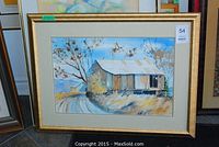 Front view of framed print artwork under glass depicting a barn scene