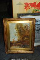 Front view of the framed oil painting showing full landscape and frame