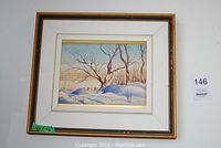 Framed watercolor painting depicting a winter landscape with snow and trees, signed by J.F. Klassen, overall view.