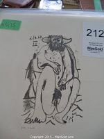 Photo of the Picasso lithograph showing seated bearded man with hat, date, and edition number 374/666.
