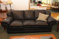 Front view of sofa with throw pillow