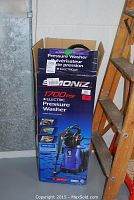 Boxed Simoniz 1700 PSI Electric Pressure Washer with model and details