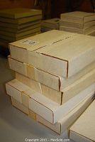 Stack of original boxes containing the collector plates