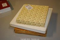 Box packaging for plates showing original wrappers and boxes