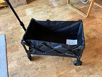 Open view of black Rainbean folding wagon