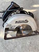 Left side view of Craftsman circular saw showing logo, size, and amperage