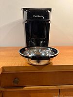 Front view of PetSafe feeder with stainless bowl attached