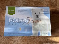 Front of retail box showing brand, model and polar bear graphic