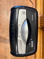 Top control panel showing model AU675XB and control buttons