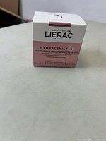 Front view of the Lierac Hydragenist Mat Moisturizing Oxygenating Cream-Gel boxed product highlighting brand and product name.