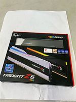 Front view of G.Skill Trident Z5 RGB DDR5 RAM kit packaging showing RGB and Intel XMP 3.0 ready sticker