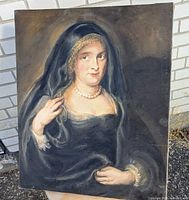 Front view of the antique oil painting of a woman in dark clothing and pearls, showing condition and color details.