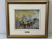 Framed oil painting featuring autumn Quebec scene with horses and carriages.