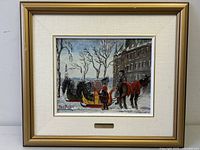 Framed oil painting on board depicting a winter Quebec scene with two horses, a child in a red coat, and a yellow-red sleigh, signed by Paule Boisvert.