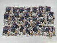 30 Beckett Baseball Card Monthly booklets individually sealed in plastic packets laid out flat