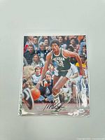 Full front view of the signed Magic Johnson photo showing image and autograph