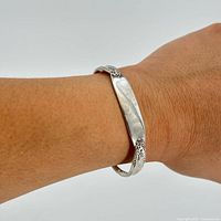 Bangle worn on wrist to show size and fit