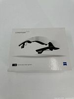 Front view of the Zeiss Cinemizer OLED box showing the product image and branding.