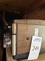 Side view showing the faux wood panel side and part of the control panel of the Sanyo VTC 9100 VCR.