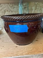 Exterior of brown glazed ceramic planter