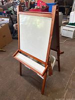 Front view showing whiteboard side and marker tray