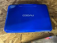 Closed blue COOAU portable DVD player top view