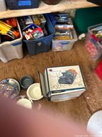 Boxed Drinkwell fountain set near bowls and filters