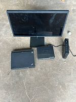 All four electronic items arranged together