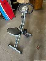 Full view of folded Exerpeutic exercise bike