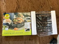 Box showing Food Network nonstick carbon steel roasting pan and rack set