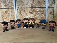 All eight Funko Pop! figures lined up