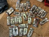 All 24 sealed action figures spread on floor