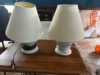 pair of lamps front view on table