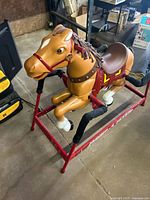 Full view of Radio Flyer ride-on horse on frame
