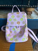 Front view of pink Sailor Moon mini backpack