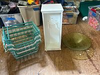 all items in lot: teal baskets, white display cabinet, green platter