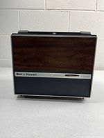 Front view of Bell & Howell projector closed