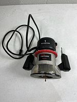 Full view of Craftsman corded router with power cord and handles