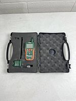 Meter, probe, and case interior showing foam cutouts